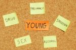 Young Concerns On A Cork Board Stock Photo