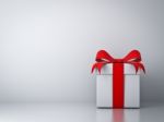 Empty White Wall With Gift Box Stock Photo