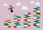 Business Woman Jumping Over Higher Stack Of Books Stock Photo