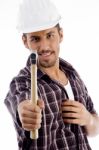 Smiling Engineer Showing Hammer Stock Photo