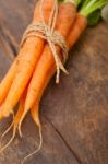 Baby Carrots Bunch Tied With Rope Stock Photo