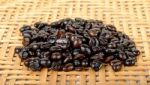 Coffee Bean On The Wooden Background Stock Photo