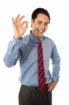 Male Executive Gesturing Ok Stock Photo