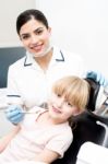 Little Girl At Annual Dental Checkup Stock Photo