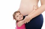 Pregnant Woman With Her Daughter Stock Photo