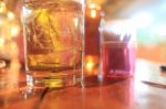 A Glass Of Whiskey On The Table Stock Photo