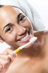 Pretty Young Woman Brushing Her Teeth Stock Photo