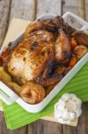 Roasted Chicken With Apples And Potatoes Stock Photo