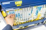 People Fix Node Fiber Optic In Network Room Stock Photo