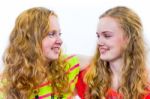 Two Smiling Teenage Girls Embracing Each Other Stock Photo