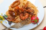 Italian Seafood Spaghetti Pasta On Red Tomato Sauce Stock Photo