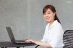 Portrait Of Thai Adult Businesswoman Beautiful Girl Using Computer Notebook Stock Photo