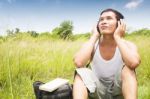 Man Listening To Music Stock Photo