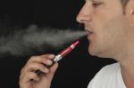 Man Using Electronic Cigarette Stock Photo