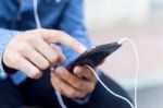 Modern Young Man With Mobile Phone In The Street Stock Photo