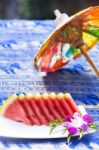 Slices Of Watermelon Served On Plate At Asian Restaurant Stock Photo