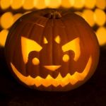 Carved Lit Halloween Pumpkin Stock Photo