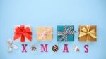 Christmas Gift Boxes With Blue Background Stock Photo