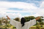 Woman On Balcony Stock Photo