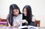 Two Asia Thai High School Student Uniform Best Friends Beautiful Girl Reading Book Stock Photo