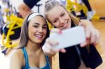 Young Women Taking A Selfie In The Gym Stock Photo