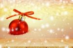 Pine Wood Table And Red Christmas Ball With Bokeh In Merry Metal Stock Photo