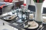 Black Dinning Table With Table Set Stock Photo