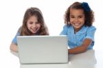 Exceited School Girls With Laptop Stock Photo