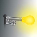 Ideas Key With Light Bulb Stock Photo