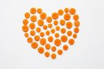 Chopped Carrot Slices Heart Shape Isolated  Stock Photo