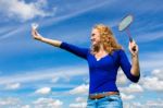 Young Dutch Woman Holding Shuttle And Badminton Racket Stock Photo