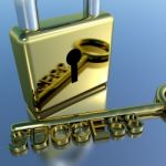 Padlock With Success Key Stock Photo