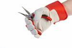 Glove Hand Holding Pliers Stock Photo