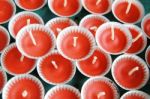 Row Of Red Candles In Small Trays Stock Photo