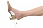 Beautiful Female Leg With Gold Shoe Stock Photo