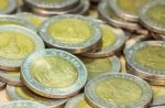 Coins Of Thailand. Wat Arun Temple In Bangkok, Thailand, Depicted In The Thai Ten Baht Coin Stock Photo