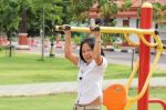 Woman Exercising Outdoor Stock Photo