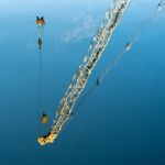 Reflection Of A Crane In A Canal In Bruges West Flanders Belgium Stock Photo