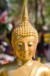 Face Of Golden Buddha Sculpture, Thailand Stock Photo