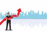 Young Businessman Holding Arrow Going Up. Successful Businessman With Growth Graph Stock Photo