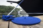 Blue Rope With Mooring Bollard Stock Photo