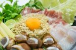 Noodle And Egg With Ingredient In Pot For Hot Sukiyaki Food Stock Photo