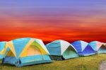 Tourist Tent With Beautiful Sunset Background Stock Photo