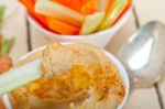 Fresh Hummus Dip With Raw Carrot And Celery Stock Photo