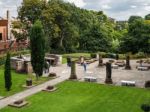 People Enjoying Roman Garden In Chester Stock Photo