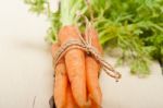 Baby Carrots Bunch Tied With Rope Stock Photo