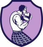 Scotsman Weight Throw Crest Retro Stock Photo