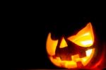 Halloween Scary Face Pumpkin  On Black Background Stock Photo