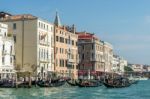 Gondoliers Ferrying People In Venice Stock Photo