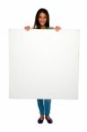 Teenage Girl Showing Blank Board Stock Photo